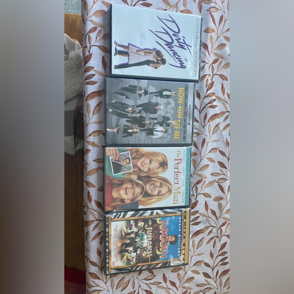 4 DVD movies brand new in plastic wrap